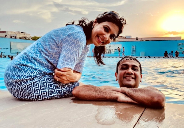 Anupam with Chhavi, pool side.