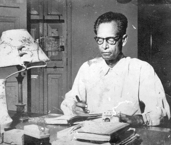 Anuradha Joshi's grandfather, Babban, at his writing desk.