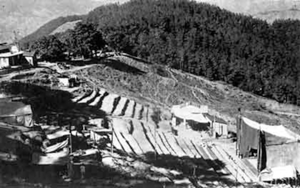 Stage on a hill slope at Almora, setup for open-air Ramlila shadow-play in October 1941. Culture centre student Guru Dutt played the role of Ram.