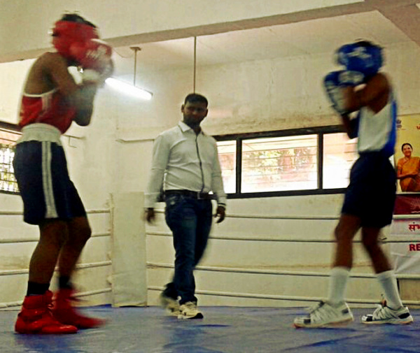 Boys in the boxing ring at Kendriya Vidyalaya No.1, Shahibaug, Ahmedabad during a regional sports meet.