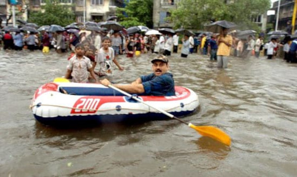 Mumbai rains 2005: a rubber dinghy on a waterlogged street.