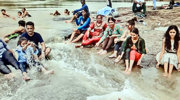 Mahendra Rathod with family at Zanzari Falls.