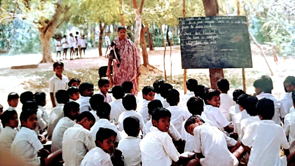 R. Meenakshi's mother, S. Lakshmi, was a teacher at a government college in Somarasanpettai village near Tiruchirapalli (Trichy), Tamil Nadu.