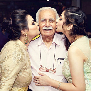 Shri Niti Paul Mehta with his granddaughter, Shweta Mehta (right), and granddaughter-in-law, Juhi Varun Mehta (left).