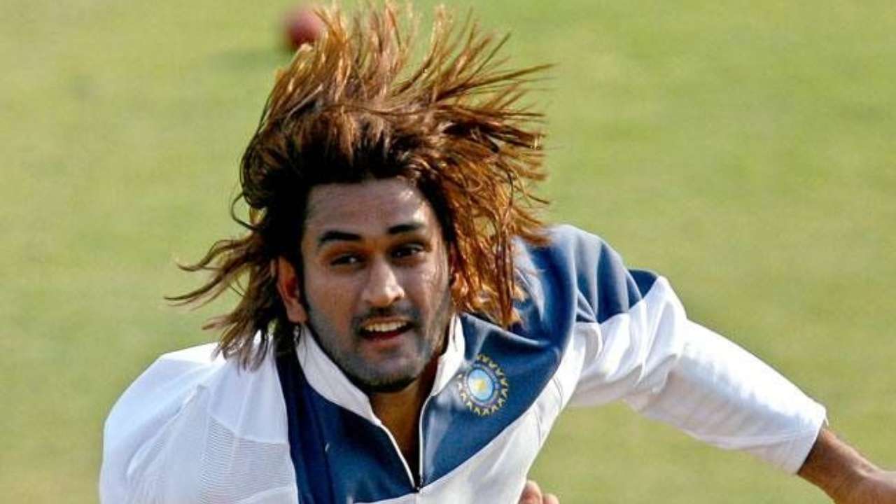 M S Dhoni with long, brown-streaked hair on his debut for the Indian cricket team in 2005.