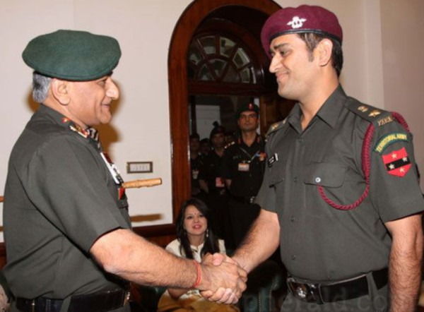 M S Dhoni, captain of the Indian cricket captain team, being conferred the rank of honorary Lieutenant Colonel in the Territorial Army by Army Chief General V.K. Singh on Oct 9, 2011.